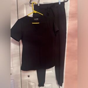 Mandala women’s scrubs. Size small top, tall small jogger pants. Black. Like new